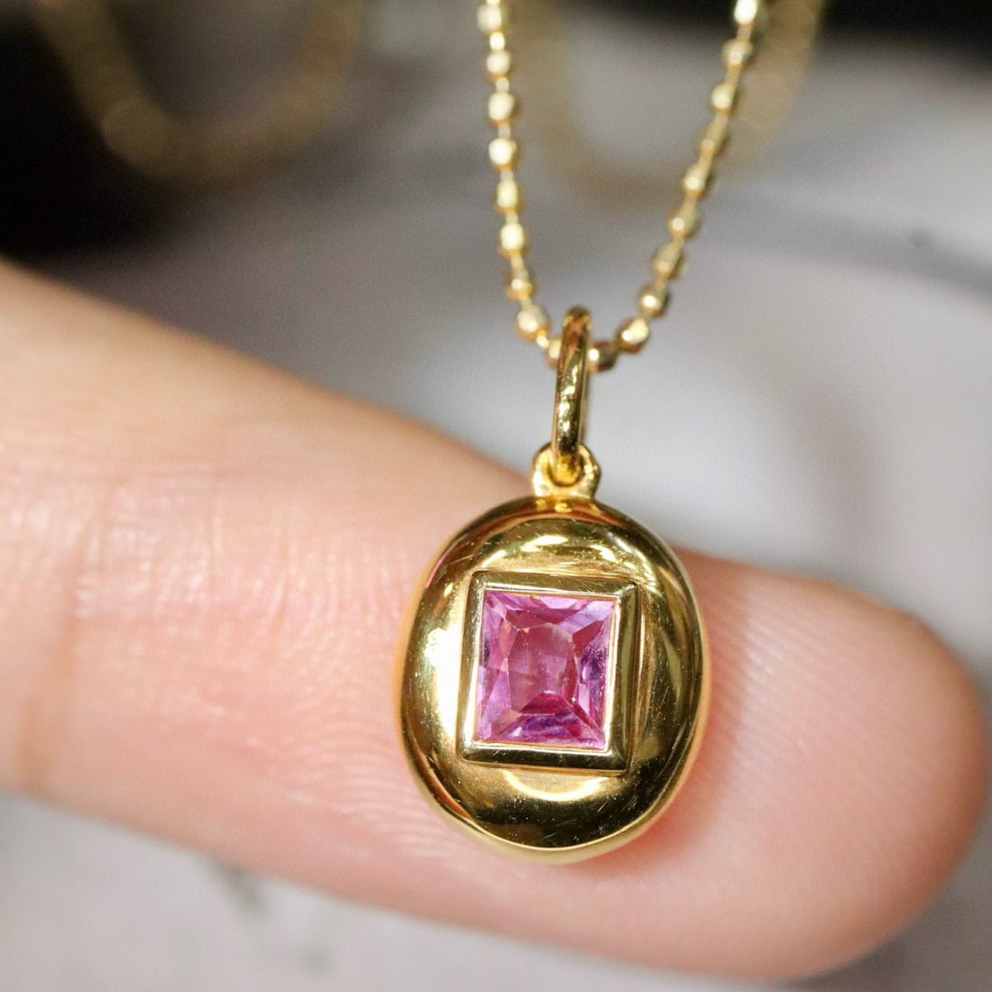 14k Gold 0.5 Ct Natural Sapphire Pendant( Without Chain ): Ref:231017067 // gold content:14k gold // main gemstone:sapphire // shape:square // carat weight:0. 5ct // color:pink // treatment:natural // Condition: New Low Estimate: 1100 High Estimate: 1700