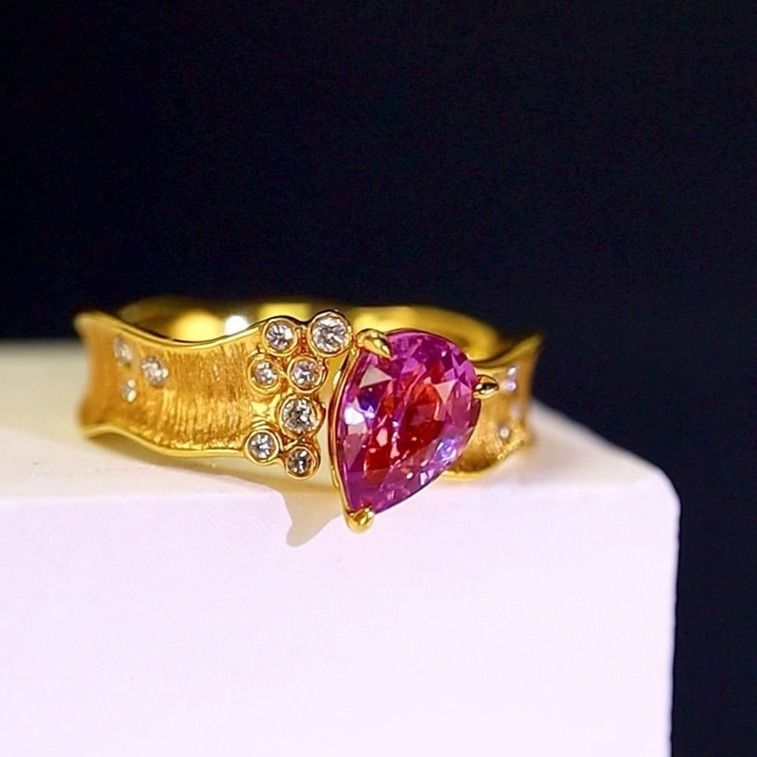 14k Gold 1.13 Ctw Natural Sapphire & Diamond Ring: Ref:231017070 // gold content:14k gold // ring size:7. 25us // // main gemstone:sapphire // shape:pear // carat weight:1. 05ct // color:purple // treatment:natural // // adjacent gemstone 2 : diamond