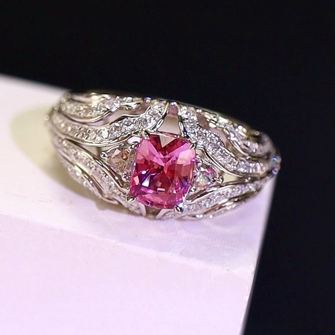14k Gold 1.91 Ctw Natural Padparadscha Sapphire & Diamond Ring: Ref:231017071 // gold content:14k gold // ring size:7. 25us // // main gemstone:padparadscha sapphire // shape:cushion // carat weight:1. 32ct // color:orangish pink // treatment:natural // //