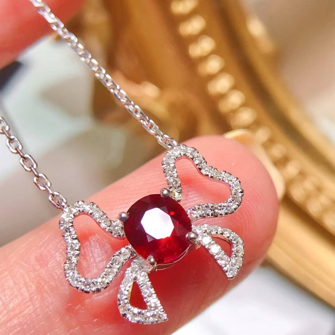14k Gold 0.86 Ctw Natural Ruby & Diamond Necklace: Ref:231017076 // gold content:14k gold // main gemstone:ruby // shape:oval // carat weight:0. 65ct // color:pigeonblood red // treatment:natural // // adjacent gemstone 2 : diamond // shape:round //