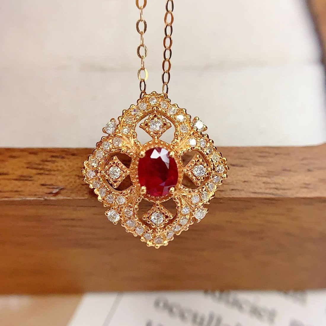 14k Gold 0.4 Ct Natural Ruby & Diamond Necklace: Ref:231017082 // gold content:14k gold // main gemstone:ruby // shape:oval // carat weight:0. 4ct // color:red // treatment:natural // // adjacent gemstone 2 : diamond // number of stones:44 //