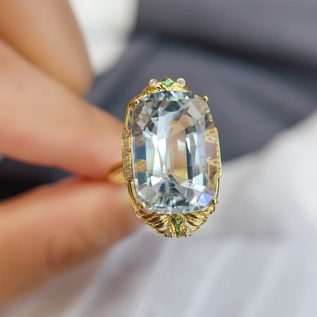 14k Gold 14.45 Ct Natural Aquamarine & Diamond & Tsavorite Ring: Ref:231017088 // gold content:14k gold // ring size:7. 25us // // main gemstone:aquamarine // shape:cushion // carat weight:14. 45ct // color:blue // treatment:natural // // adjacent gemstone 2 :