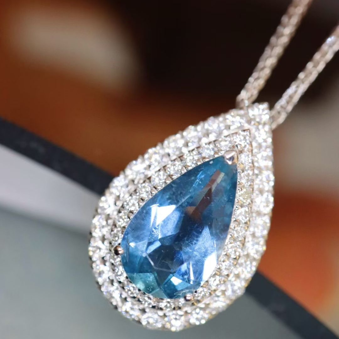 14k Gold 1.54 Ctw Natural Aquamarine & Diamond Pendant( Without Chain ): Ref:231017150 // gold content:14k gold // main gemstone:aquamarine // shape:pear // carat weight:1. 16ct // color:santa maria color // treatment:natural // // adjacent gemstone 2 : diamond // shape:ro