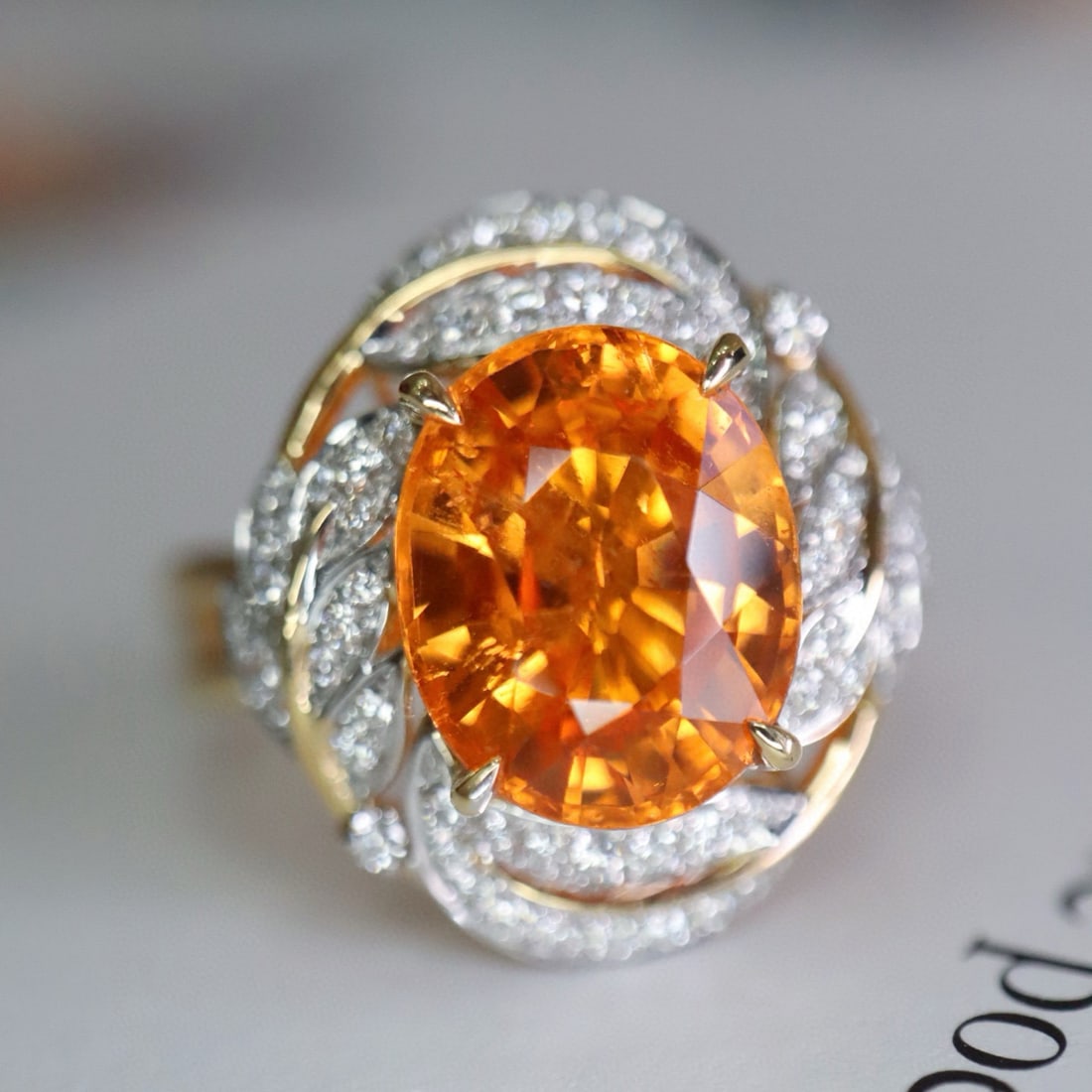 14k Gold 4.48 Ctw Natural Spessartine & Diamond Ring: Ref:231017178 // gold content:14k gold // ring size:7. 25us // // main gemstone:spessartine // shape:oval // carat weight:4. 20ct // color:orange // treatment:natural // // adjacent gemstone 2 :