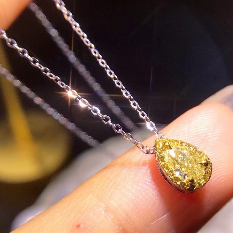 14k Gold 0.35 Ct Natural Yellow Diamond & Yellow Diamond Necklace: Ref:231017188 // gold content:14k gold // main gemstone:yellow diamond // shape:pear // carat weight:0. 35ct // color:yellow // treatment:natural // // adjacent gemstone 2 : yellow diamond //