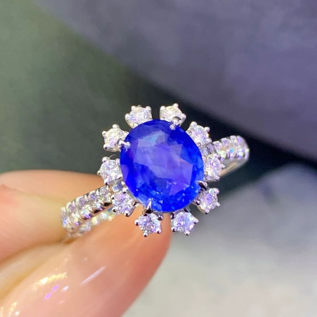 14k Gold 2.45 Ctw Natural Sapphire & Diamond Ring: Ref:231017189 // gold content:14k gold // ring size:7. 25us // // main gemstone:sapphire // shape:oval // carat weight:2. 01ct // color:cornflower blue // treatment:natural // // adjacent gemstone 2 :