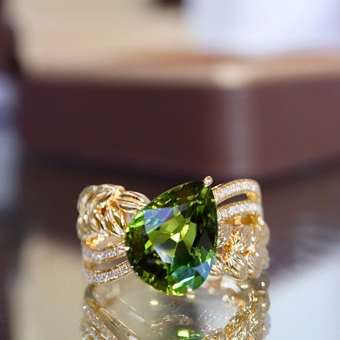 14k Gold 3.61 Ctw Natural Tourmaline & Diamond Ring: Ref:231017196 // gold content:14k gold // ring size:7. 25us // // main gemstone:tourmaline // shape:pear // carat weight:3. 50ct // color:green // treatment:natural // // adjacent gemstone 2 :