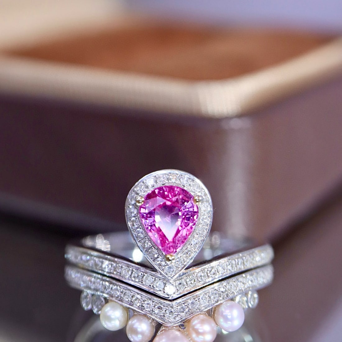 14k Gold 1.00 Ctw Natural Padparadscha Sapphire & Diamond Ring: Ref:231018012 // gold content:14k gold // ring size:7. 25us // // main gemstone:padparadscha sapphire // shape:pear // carat weight:0. 70ct // color:orangish pink // treatment:natural // // adjacent