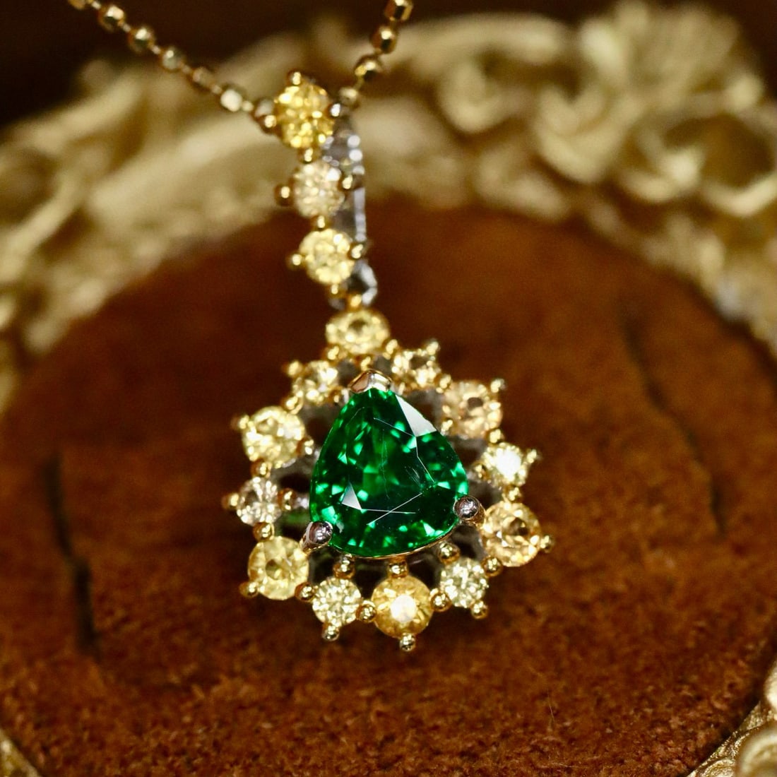 14k Gold 1.49 Ctw Vivid Green Natural Tsavorite & Sapphire Pendant( Without Chain ): Ref:231018014 // gold content:14k gold // main gemstone:tsavorite // shape:pear // carat weight:0. 75ct // color:vivid green // treatment:natural // // adjacent gemstone 2 : sapphire // shape:round