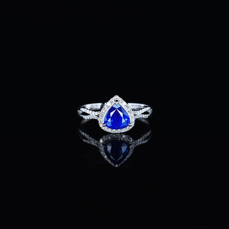 14k Gold 1.33 Ctw Natural Sapphire & Diamond Ring: Ref:231018024 // gold content:14k gold // ring size:7. 25us // // main gemstone:sapphire // shape:pear // carat weight:1. 15ct // color:royal blue // treatment:natural // // adjacent gemstone 2 :