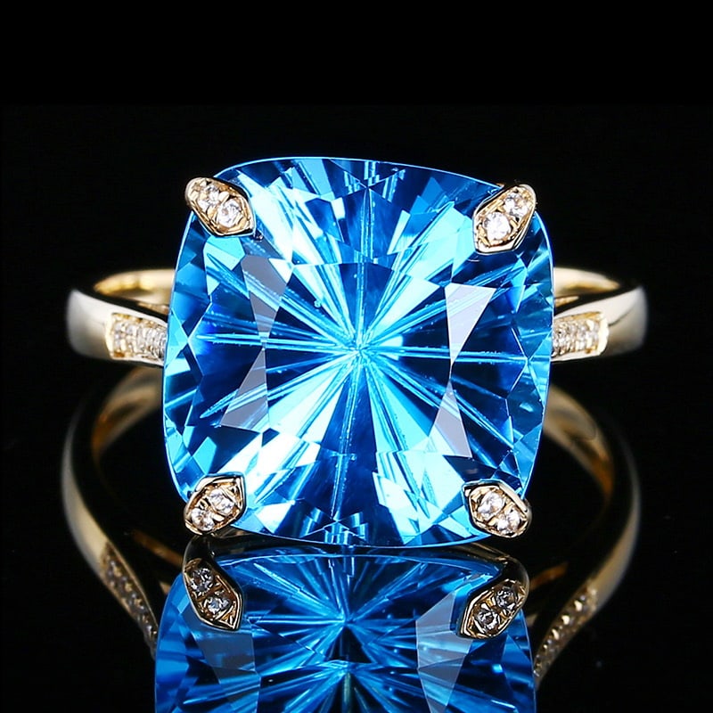 14k Gold 8.2 Ct Natural Topaz & Diamond Ring: Ref:231018055 // gold content:14k gold // ring size:7. 25us // // main gemstone:topaz // shape:cushion // carat weight:8. 2ct // color:blue // treatment:natural // // adjacent gemstone 2 : diamond //