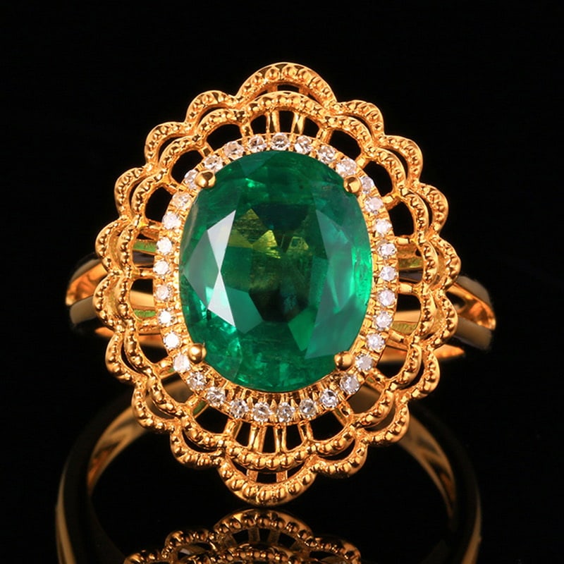 14k Gold 4.02 Ctw Vivid Green Natural Emerald & Diamond Ring: Ref:231018072 // gold content:14k gold // ring size:7. 25us // // main gemstone:emerald // shape:oval // carat weight:3. 86ct // color:vivid green // treatment:natural // // adjacent gemstone 2 : diam