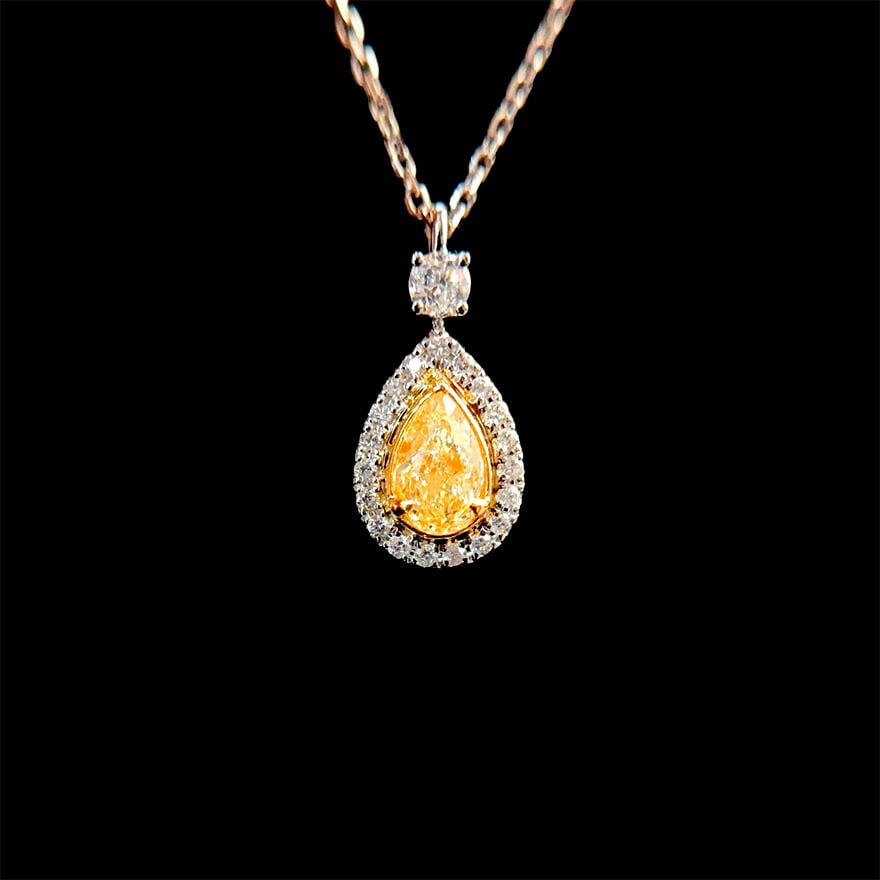 14k Gold 0.60 Ctw Natural Yellow Diamond & Diamond Pendant( Without Chain ): Ref:231018100 // gold content:14k gold // main gemstone:yellow diamond // shape:pear // carat weight:0. 44ct // color:yellow // treatment:natural // // adjacent gemstone 2 : diamond // shape:round //
