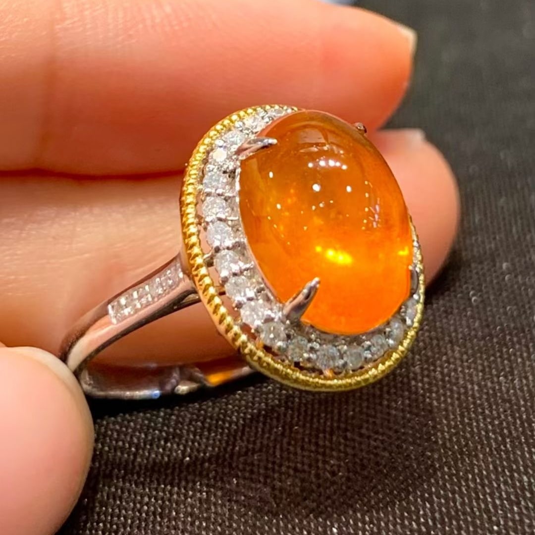 14k Gold 6 Ct Natural Spessartine & Diamond Ring: Ref:231018109 // gold content:14k gold // ring size:7. 25us // // main gemstone:spessartine // shape:oval // carat weight:6ct // color:orange // treatment:natural // // adjacent gemstone 2 : diamond