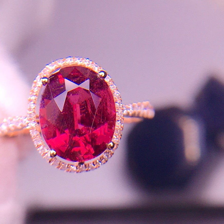 14k Gold 3 Ct Natural Tourmaline & Diamond Ring: Ref:231018113 // gold content:14k gold // ring size:7. 25us // // main gemstone:tourmaline // shape:oval // carat weight:3ct // color:red // treatment:natural // // adjacent gemstone 2 : diamond //