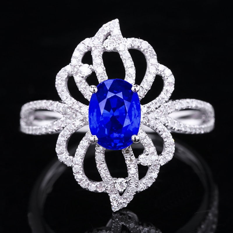 14k Gold 1.85 Ctw Vivid Blue Natural Sapphire & Diamond Ring: Ref:231018146 // gold content:14k gold // ring size:7. 25us // // main gemstone:sapphire // shape:oval // carat weight:1. 37ct // color:vivid blue // treatment:natural // // adjacent gemstone 2 :