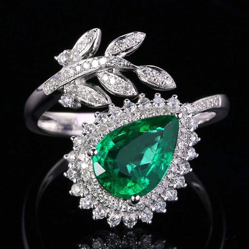 14k Gold 1.97 Ctw Vivid Green Natural Emerald & Diamond Ring: Ref:231018158 // gold content:14k gold // ring size:7. 25us // // main gemstone:emerald // shape:pear // carat weight:1. 49ct // color:vivid green // treatment:natural // // adjacent gemstone 2 :