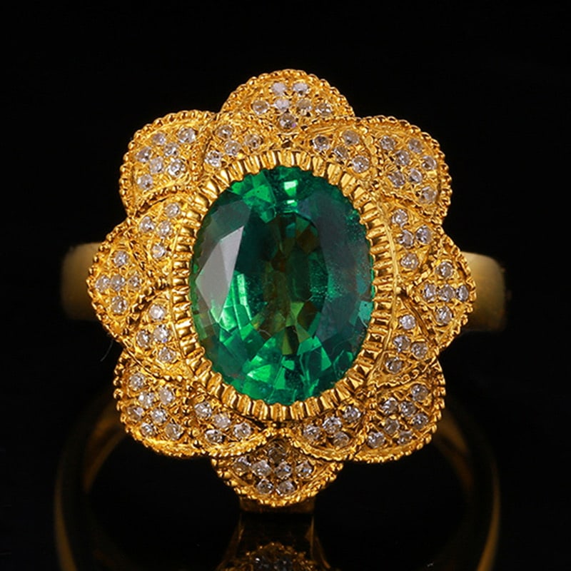 14k Gold 2.61 Ctw Vivid Green Natural Emerald & Diamond Ring: Ref:231018169 // gold content:14k gold // ring size:7. 25us // // main gemstone:emerald // shape:oval // carat weight:2. 29ct // color:vivid green // treatment:natural // // adjacent gemstone 2 : diam