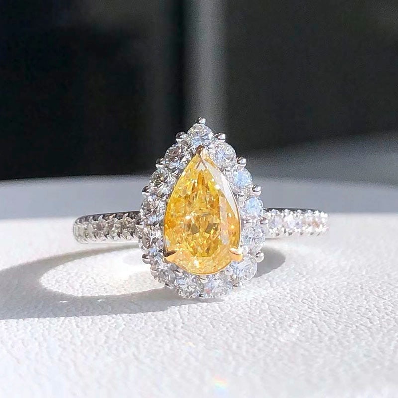 14k Gold 1.58 Ctw Natural Yellow Diamond & Diamond Ring: Ref:231018174 // gold content:14k gold // ring size:7. 25us // // main gemstone:yellow diamond // shape:pear // carat weight:1. 00ct // color:yellow // treatment:natural // // adjacent gemstone 2 : di