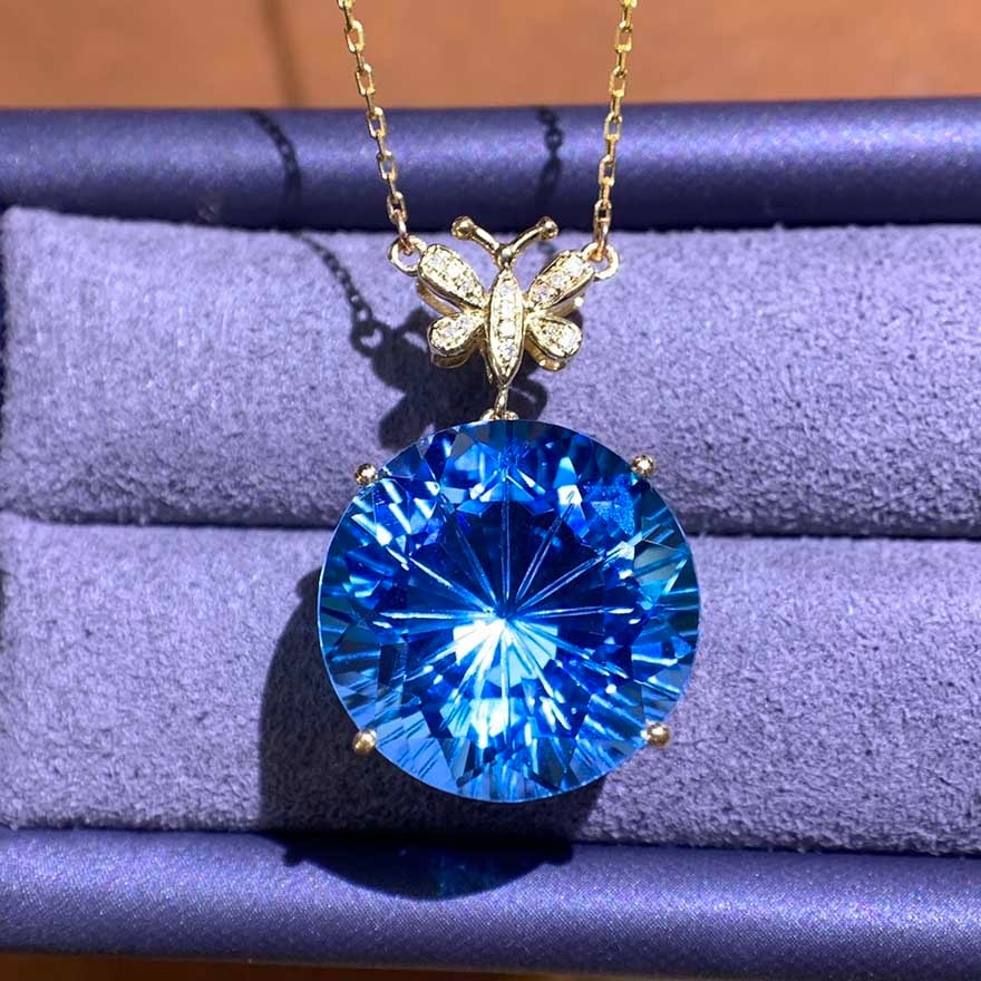14k Gold 13.04 Ctw Natural Topaz & Diamond Necklace: Ref:231018178 // gold content:14k gold // main gemstone:topaz // shape:round // carat weight:13ct // color:blue // treatment:natural // cut grade:g // // adjacent gemstone 2 : diamond // number of