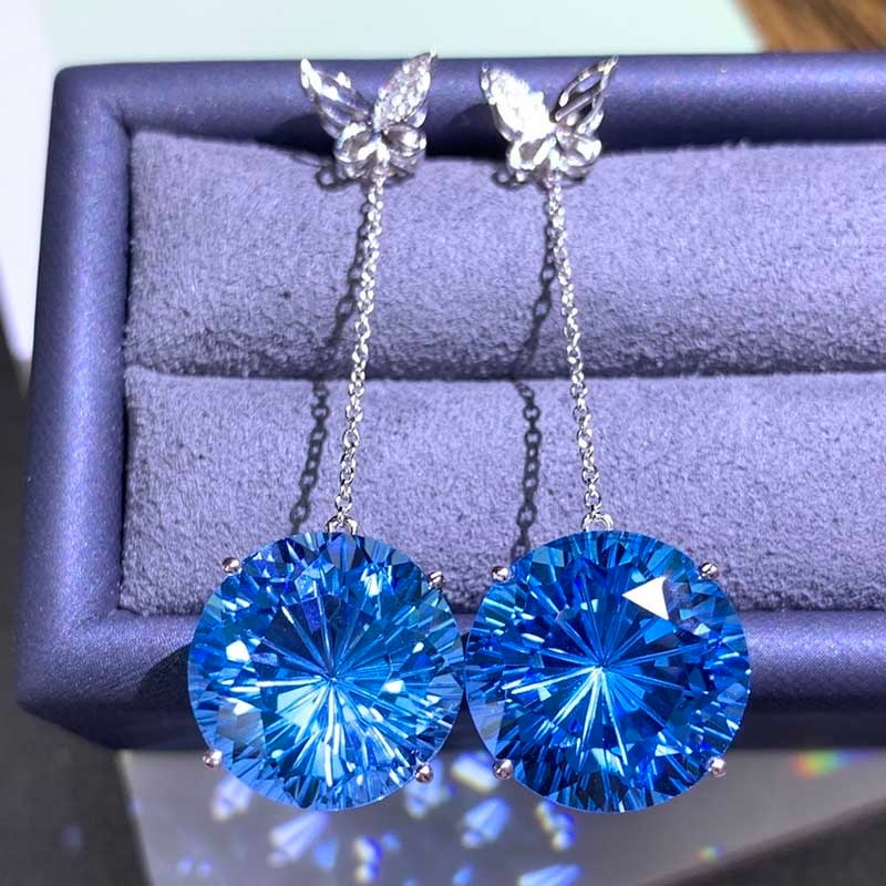 14k Gold 21.32 Ct Natural Topaz & Diamond Earrings: Ref:231018179 // gold content:14k gold // main gemstone:topaz // shape:round // carat weight:21. 32ct // color:blue // treatment:natural // cut grade:g // // adjacent gemstone 2 : diamond //