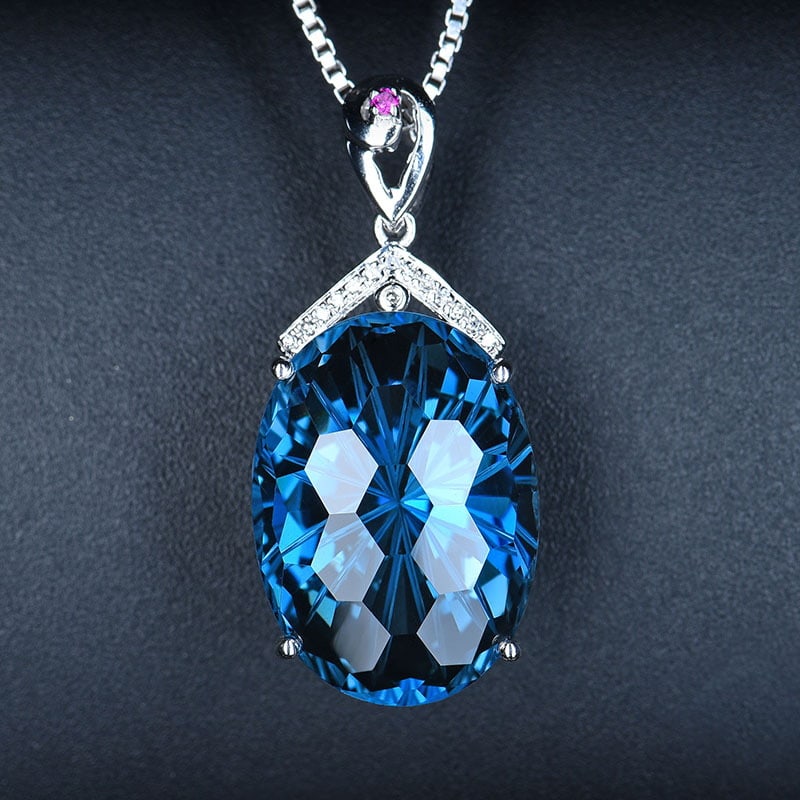 14k Gold 18.01 Ct Natural Topaz & Diamond & Ruby Pendant( Without Chain ): Ref:231018180 // gold content:14k gold // main gemstone:topaz // shape:oval // carat weight:18. 01ct // color:blue // treatment:natural // // adjacent gemstone 2 : diamond // shape:round // clarity