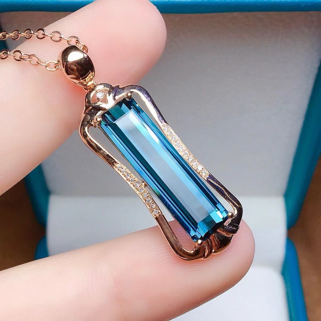 14k Gold 7.2 Ct Natural Tourmaline & Diamond Pendant( Without Chain ): Ref:231018238 // gold content:14k gold // main gemstone:tourmaline // shape:octagonal // carat weight:7. 2ct // color:blue // treatment:natural // // adjacent gemstone 2 : diamond // number of