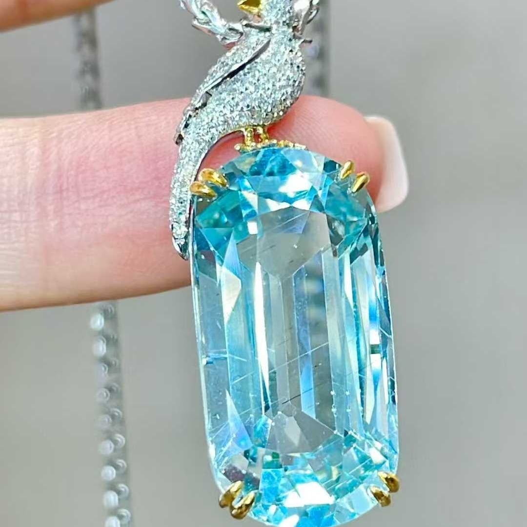 14k Gold 15.2 Ct Natural Aquamarine & Diamond Pendant( Without Chain ): Ref:231018241 // gold content:14k gold // main gemstone:aquamarine // shape:oval // carat weight:15. 2ct // color:blue // treatment:natural // // adjacent gemstone 2 : diamond // shape:round //