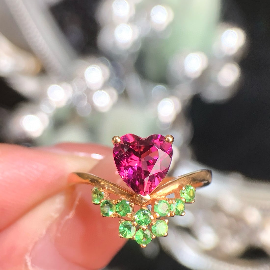 14k Gold 1.21 Ct Natural Tourmaline & Tsavorite Ring: Ref:231018253 // gold content:14k gold // ring size:7. 25us // // main gemstone:tourmaline // shape:heart // carat weight:1. 21ct // color:red // treatment:natural // // adjacent gemstone 2 :