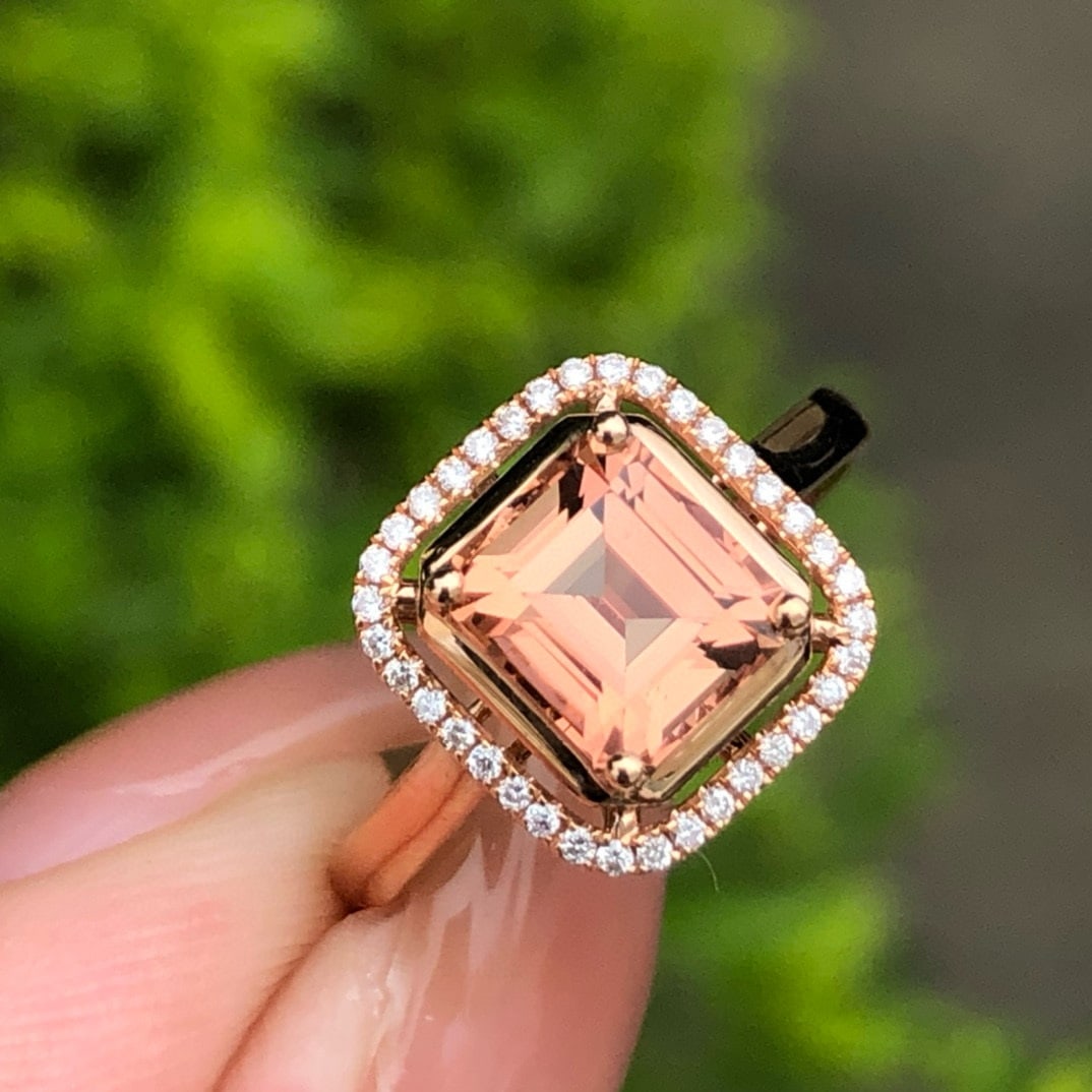 14k Gold 1.54 Ct Natural Tourmaline & Diamond Ring: Ref:231018254 // gold content:14k gold // ring size:7. 25us // // main gemstone:tourmaline // shape:octagonal // carat weight:1. 54ct // color:orange // treatment:natural // // adjacent gemstone 2 :