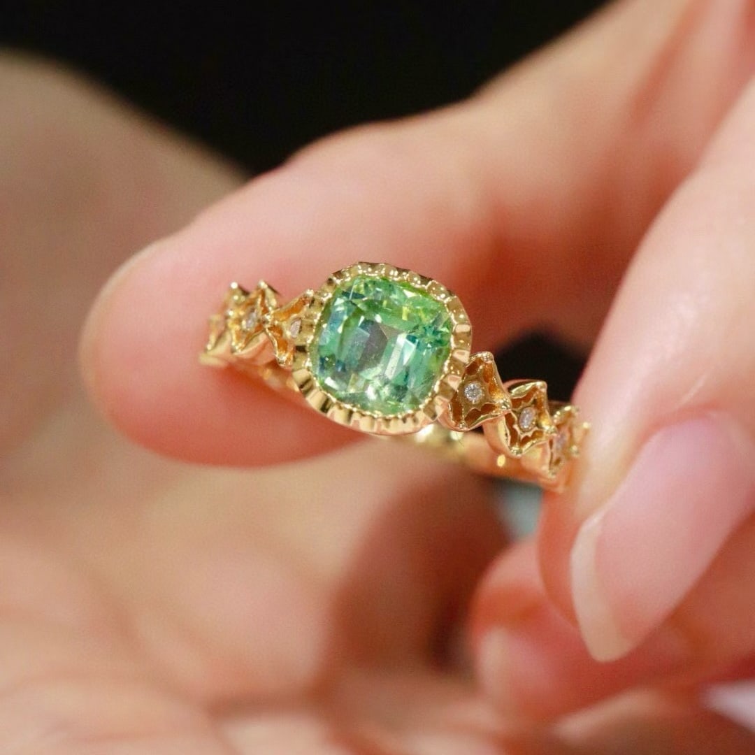 14k Gold 1.12 Ctw Natural Tourmaline & Diamond Ring: Ref:231018255 // gold content:14k gold // ring size:7. 25us // // main gemstone:tourmaline // shape:cushion // carat weight:1. 1ct // color:green // treatment:natural // // adjacent gemstone 2 :