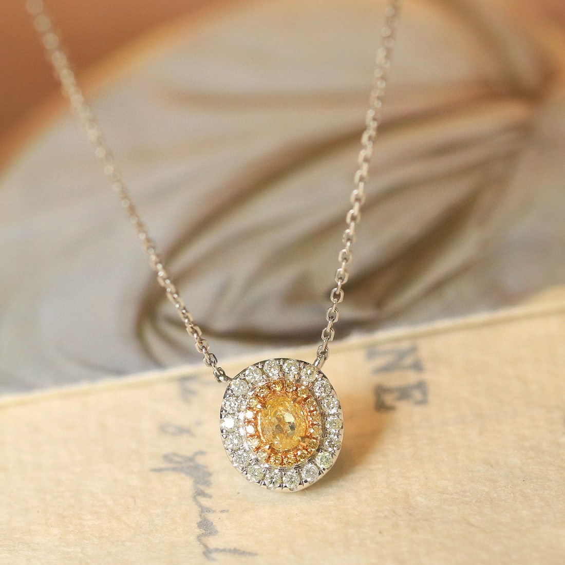 14k Gold 0.4 Ctw Natural Yellow Diamond & Diamond Necklace: Ref:231018264 // gold content:14k gold // main gemstone:yellow diamond // shape:oval // carat weight:0. 2ct // color:yellow // treatment:natural // // adjacent gemstone 2 : diamond // shape:round //