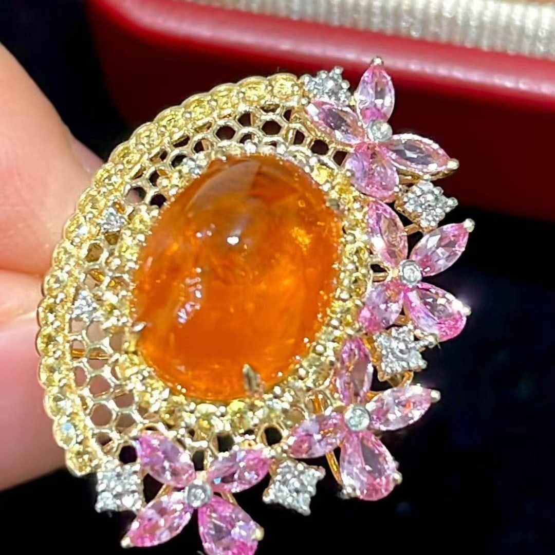 14k Gold 7.3 Ct Natural Spessartine & Diamond & Sapphire Ring: Ref:231018269 // gold content:14k gold // ring size:7. 25us // // main gemstone:spessartine // shape:oval // carat weight:7. 3ct // color:orange // treatment:natural // // adjacent gemstone 2 :