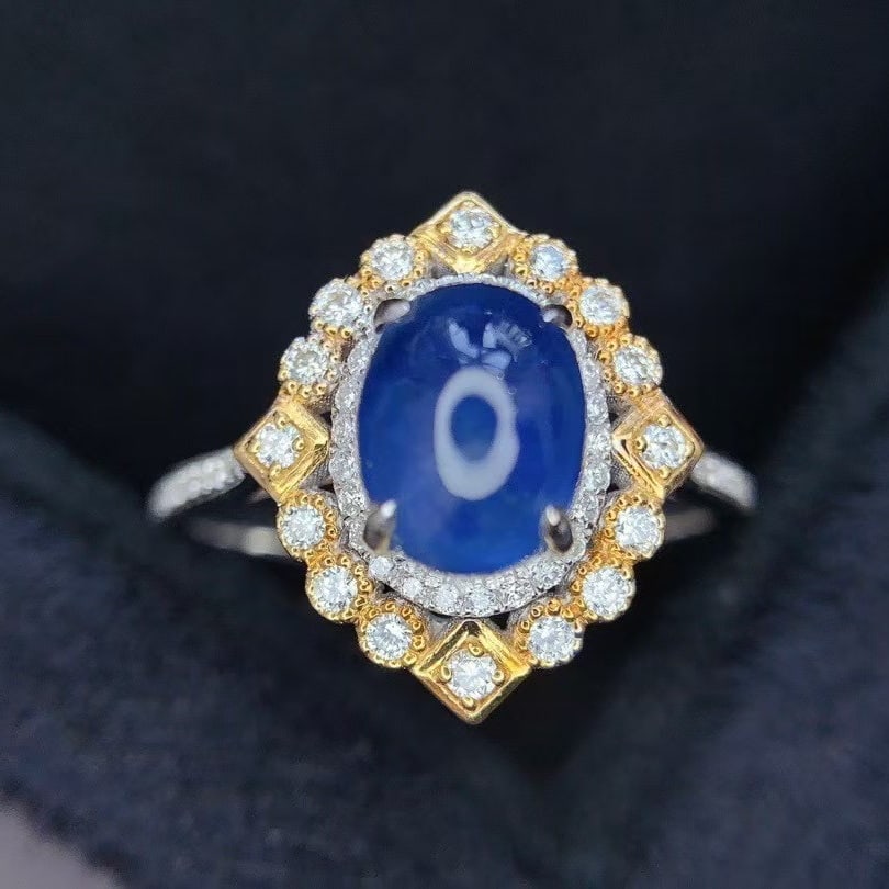 14k Gold 2.75 Ct Natural Star Sapphire & Diamond Ring: Ref:231018301 // gold content:14k gold // ring size:7. 25us // // main gemstone:star sapphire // shape:oval // carat weight:2. 75ct // color:blue // treatment:natural // // adjacent gemstone 2 :