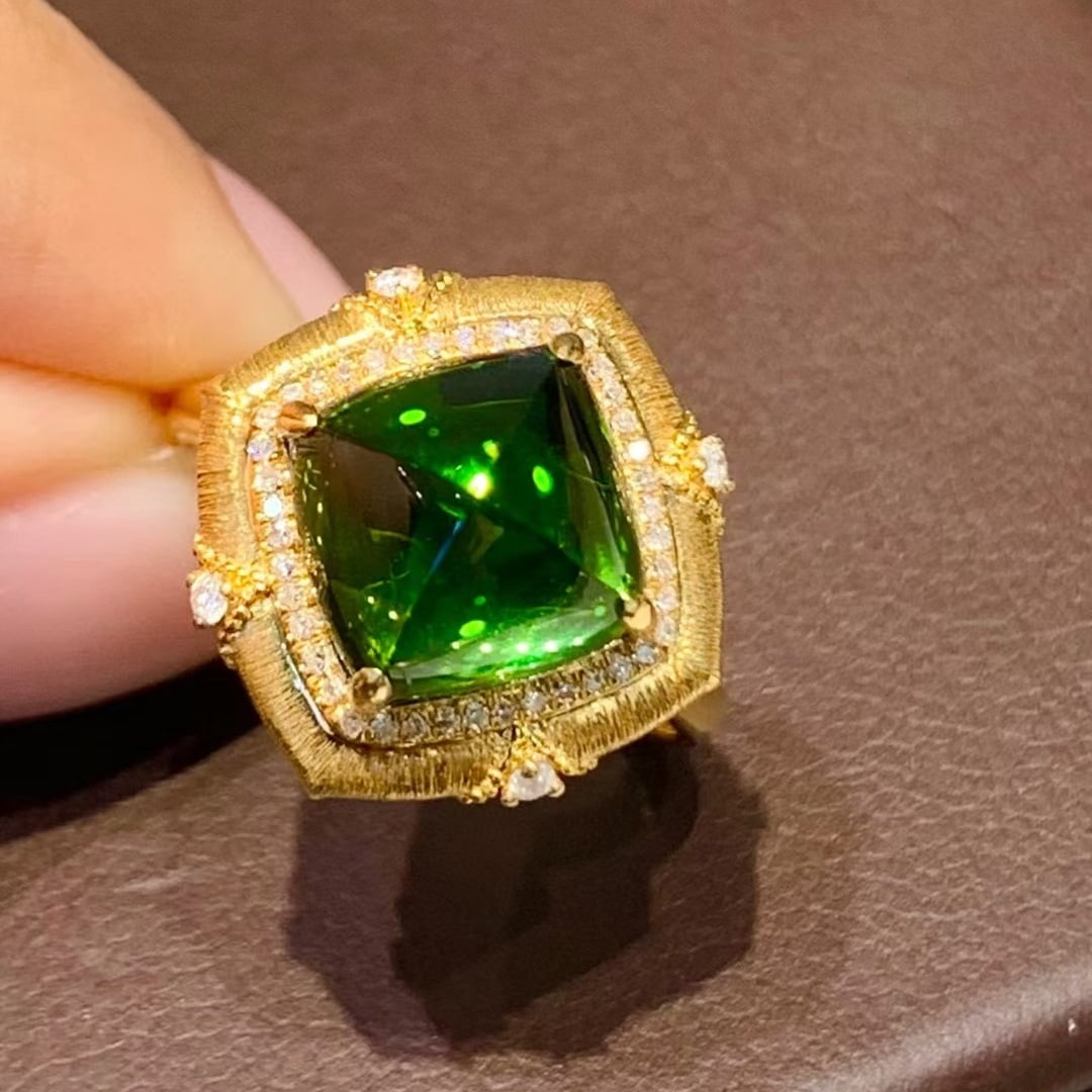 14k Gold 4.85 Ct Natural Tourmaline & Diamond Ring: Ref:231018315 // gold content:14k gold // ring size:7. 25us // // main gemstone:tourmaline // shape:suger-loaf // carat weight:4. 85ct // color:green // treatment:natural // // adjacent gemstone 2 :