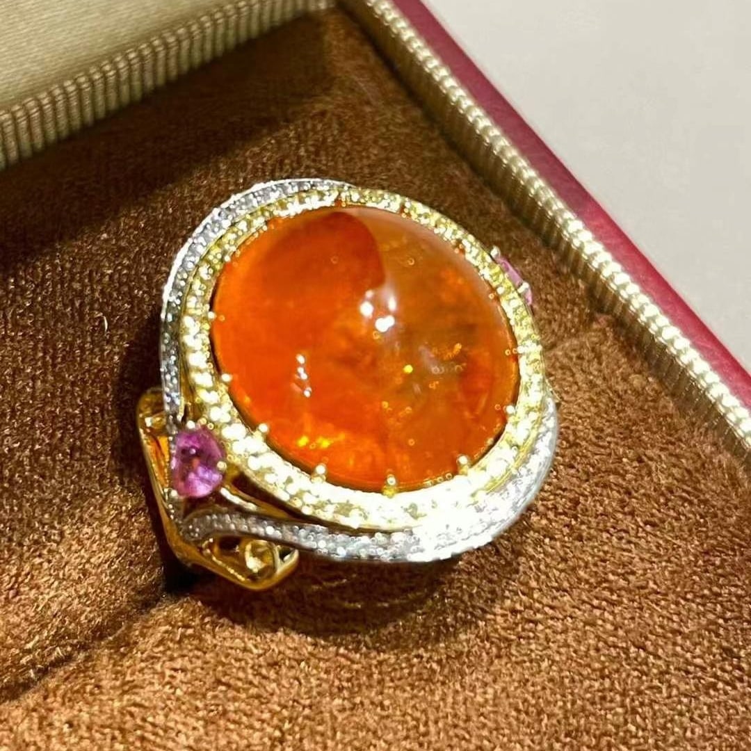 14k Gold 13.2 Ct Natural Spessartine & Diamond Ring: Ref:231018320 // gold content:14k gold // ring size:7. 25us // // main gemstone:spessartine // shape:oval // carat weight:13. 2ct // color:orange // treatment:natural // // adjacent gemstone 2 :