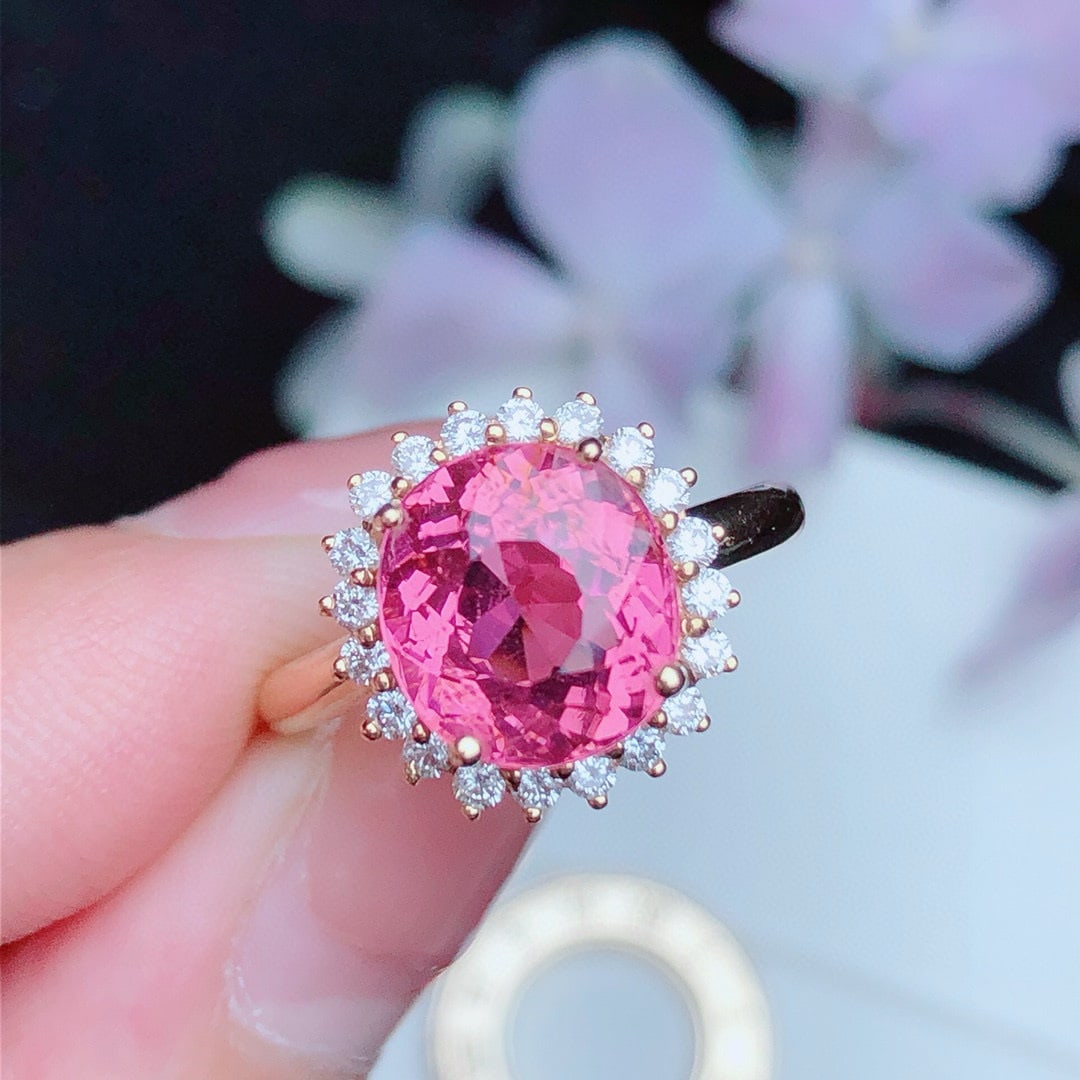 14k Gold 3.68 Ct Natural Tourmaline & Diamond Ring: Ref:231018322 // gold content:14k gold // ring size:7. 25us // // main gemstone:tourmaline // shape:oval // carat weight:3. 68ct // color:pink // treatment:natural // // adjacent gemstone 2 : diamond