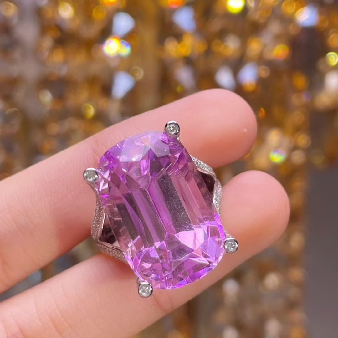 14k Gold 22.9 Ct Natural Kunzite & Diamond Ring: Ref:231018328 // gold content:14k gold // ring size:7. 25us // // main gemstone:kunzite // shape:cushion // carat weight:22. 9ct // color:purple // treatment:natural // // adjacent gemstone 2 :