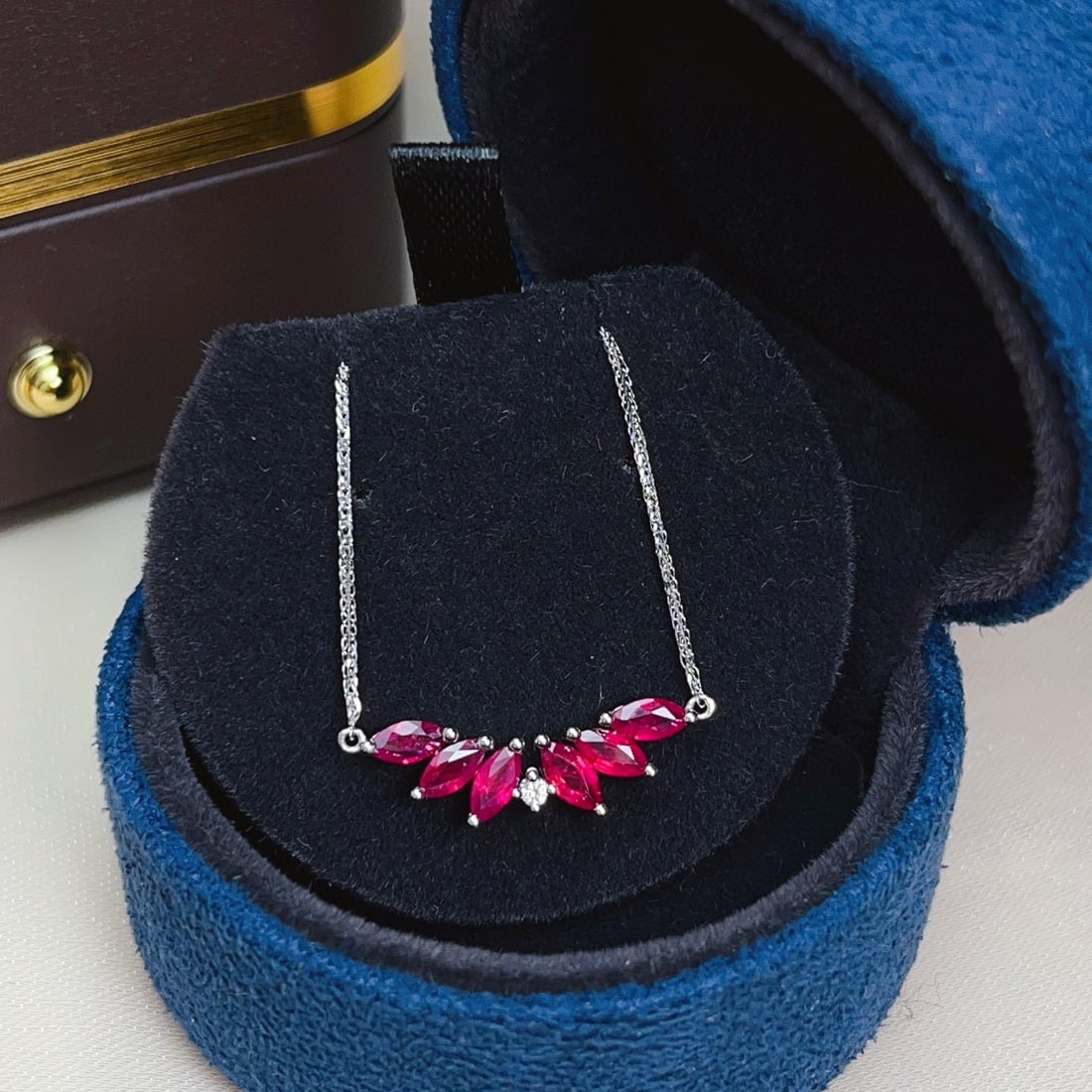 14k Gold 1.30 Ct Natural Ruby & Sapphire Necklace: Ref:231018334 // gold content:14k gold // main gemstone:ruby // shape:marquise // carat weight:1. 30ct // color:red // treatment:natural // // adjacent gemstone 2 : sapphire // number of stones:1 //