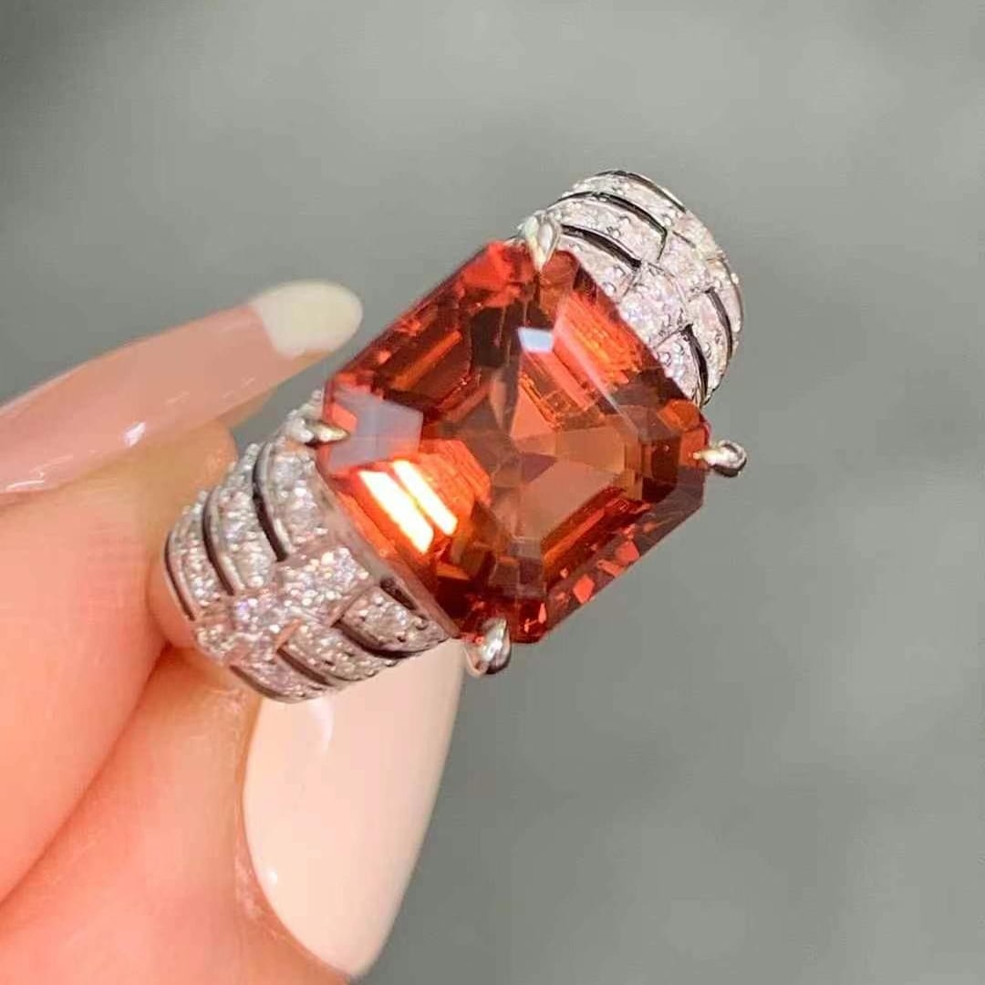 14k Gold 5.02 Ctw Natural Tourmaline & Diamond Ring: Ref:231018354 // gold content:14k gold // ring size:7. 25us // // main gemstone:tourmaline // shape:octagonal // carat weight:4. 61ct // color:orange // treatment:natural // // adjacent gemstone 2 :
