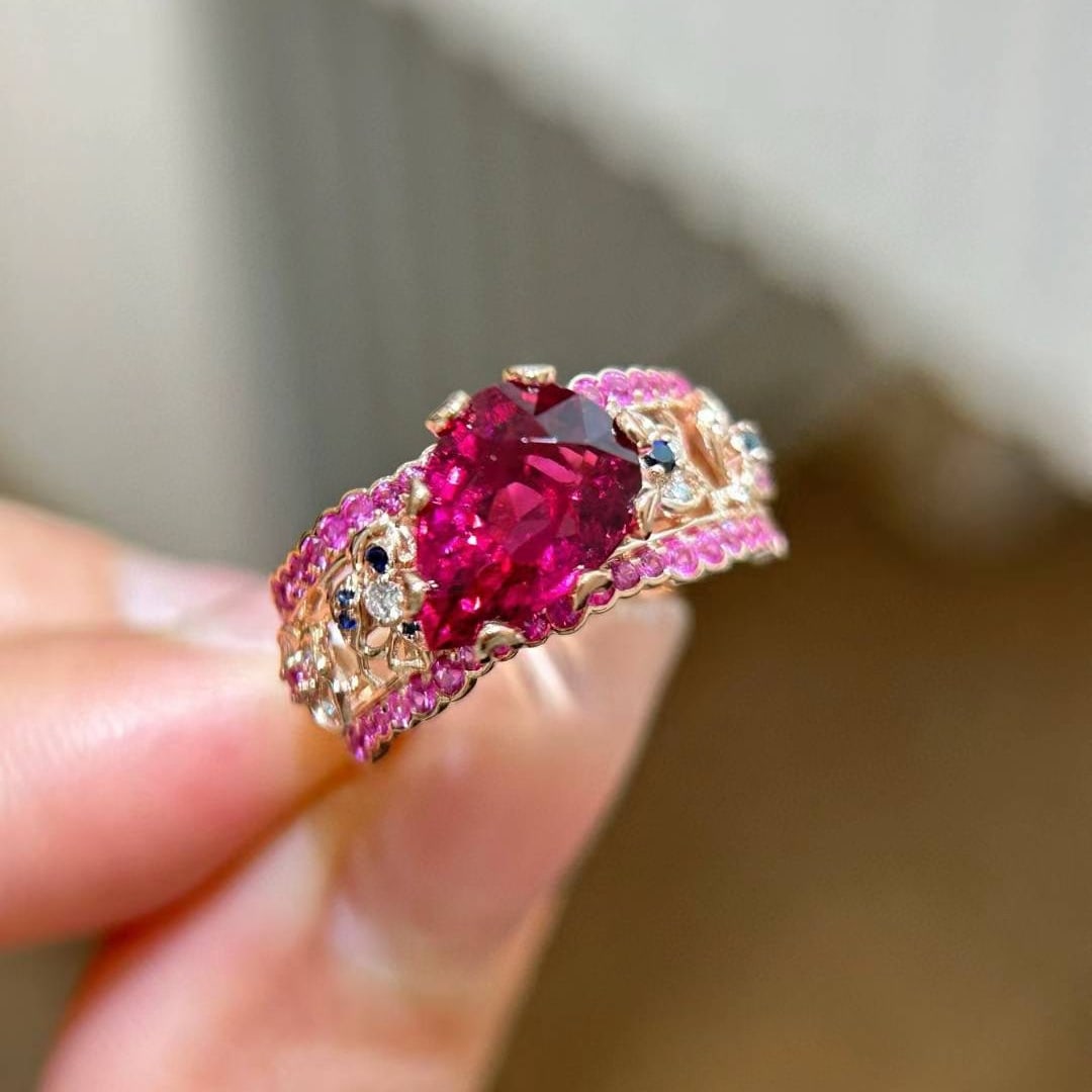 14k Gold 3.9 Ctw Natural Tourmaline & Sapphire Ring: Ref:231018356 // gold content:14k gold // ring size:7. 25us // // main gemstone:tourmaline // shape:pear // carat weight:3. 2ct // color:red // treatment:natural // // adjacent gemstone 2 : sapphire /