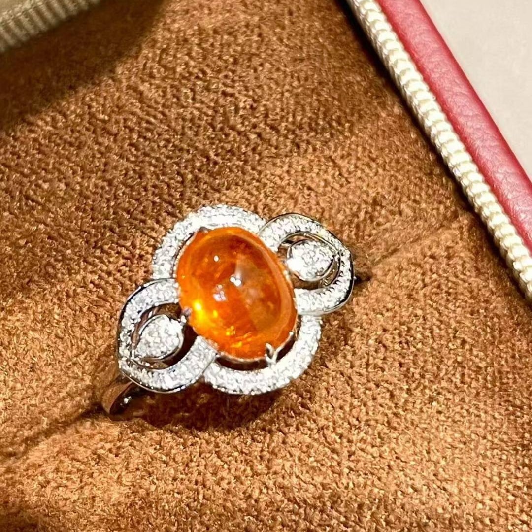14k Gold 2.68 Ct Natural Spessartine & Diamond Ring: Ref:231018360 // gold content:14k gold // ring size:7. 25us // // main gemstone:spessartine // shape:oval // carat weight:2. 68ct // color:orange // treatment:natural // // adjacent gemstone 2 :