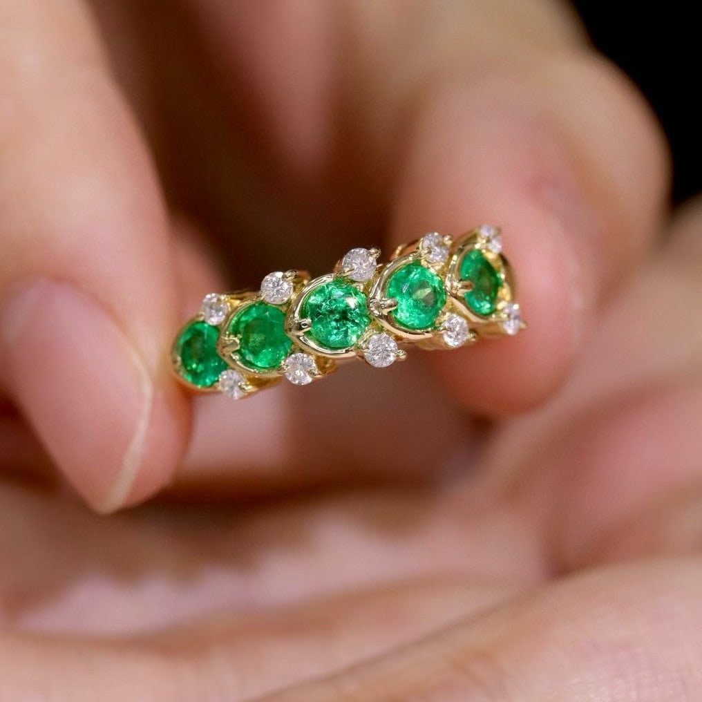 14k Gold 0.72 Ctw Natural Emerald & Diamond Ring: Ref:231018361 // gold content:14k gold // ring size:7. 25us // // main gemstone:emerald // shape:round // carat weight:0. 54ct // color:green // treatment:natural // cut grade:g // // adjacent