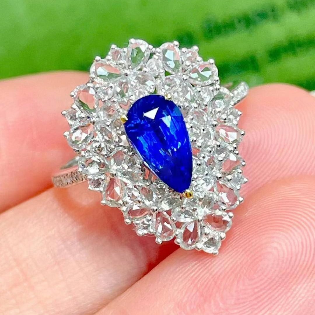 14k Gold 1.11 Ct Natural Sapphire & Diamond & Sapphire Ring: Ref:231018366 // gold content:14k gold // ring size:7. 25us // // main gemstone:sapphire // shape:pear // carat weight:1. 11ct // color:royal blue // treatment:natural // // adjacent gemstone 2 :
