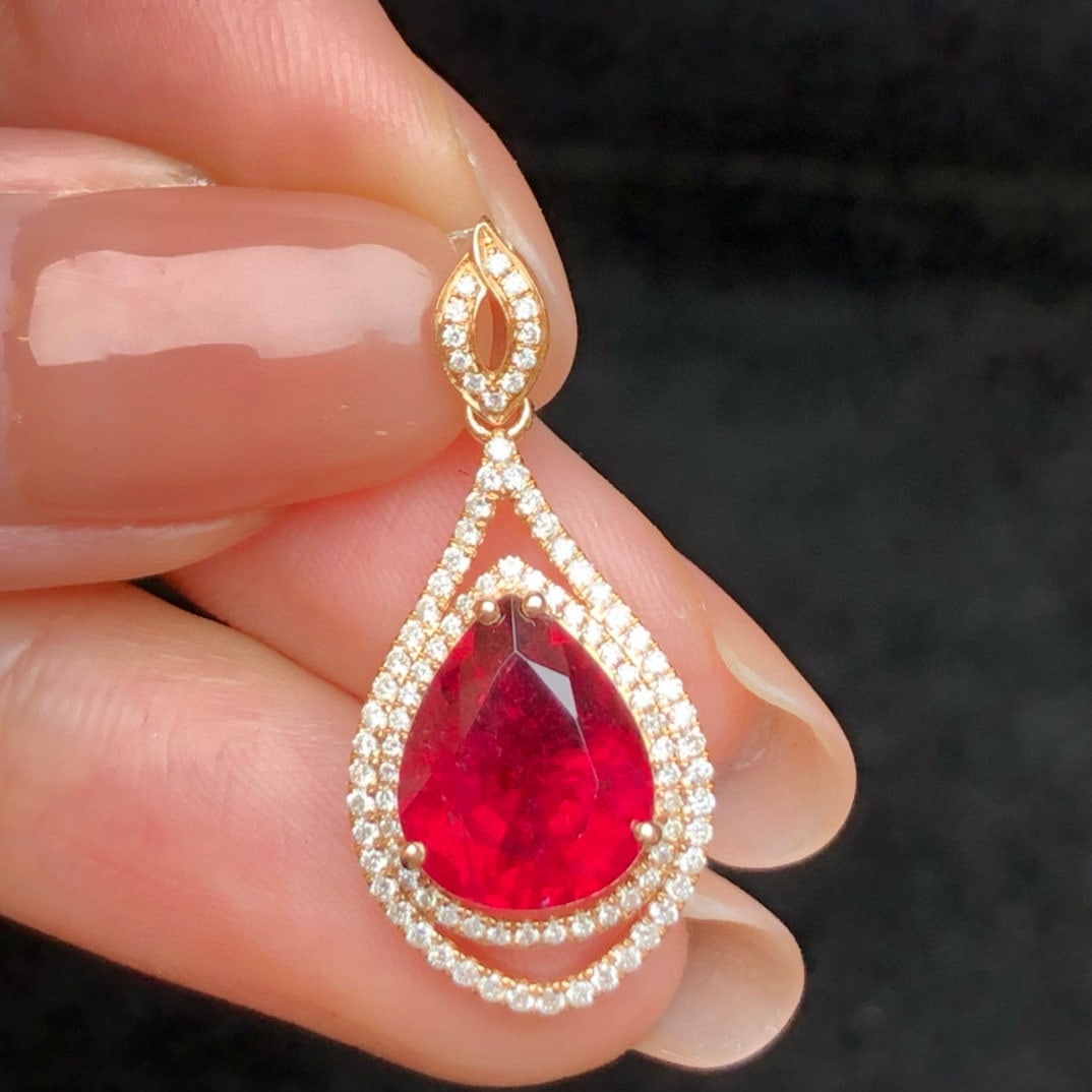 14k Gold 3.63 Ct Natural Tourmaline & Diamond Pendant( Without Chain ): Ref:231018382 // gold content:14k gold // main gemstone:tourmaline // shape:pear // carat weight:3. 63ct // color:red // treatment:natural // // adjacent gemstone 2 : diamond // number of stones:95