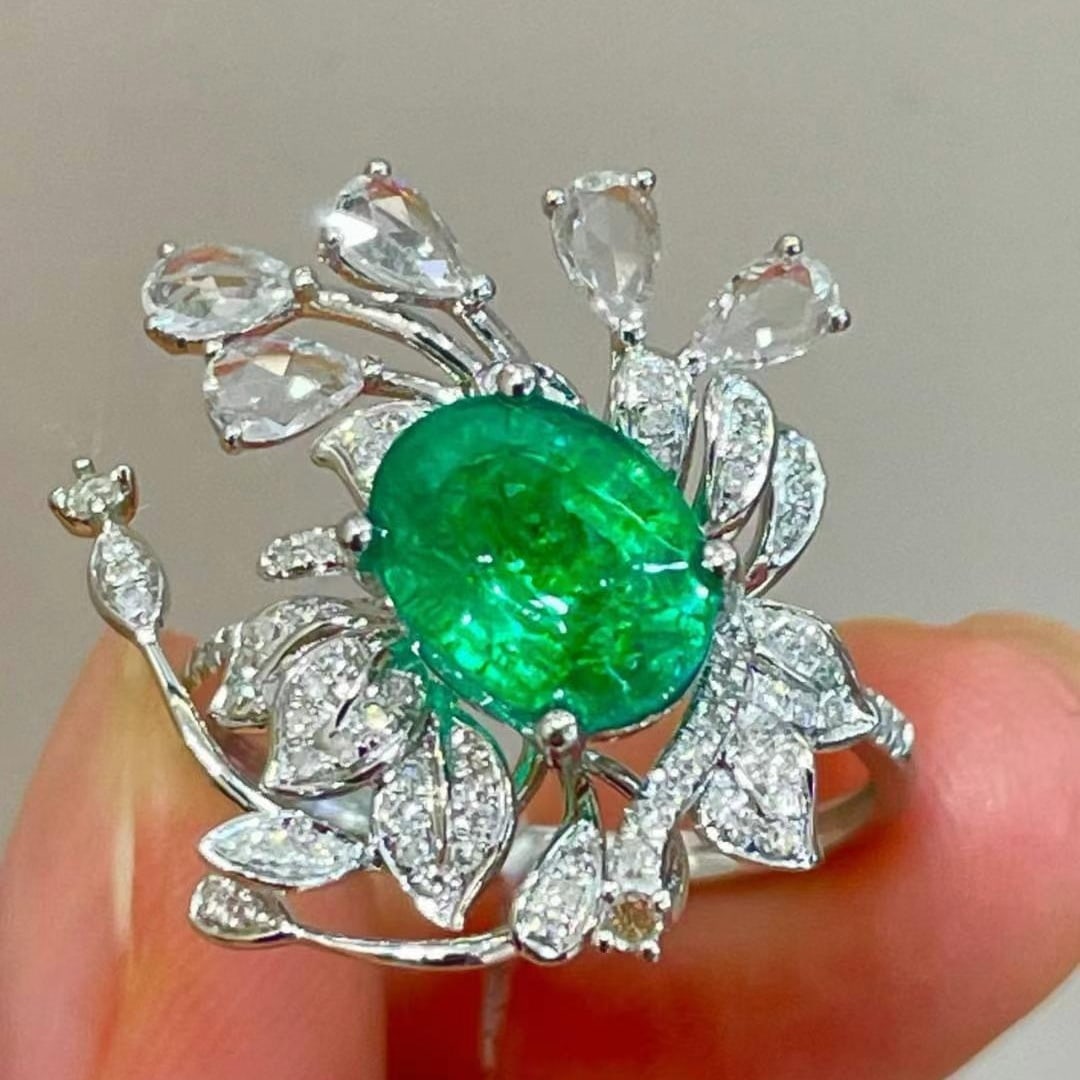 14k Gold 2.3 Ct Vivid Green Natural Emerald & Diamond & Sapphire Ring: Ref:231018402 // gold content:14k gold // ring size:7. 25us // // main gemstone:emerald // shape:oval // carat weight:2. 3ct // color:vivid green // treatment:natural // // adjacent gemstone 2 :