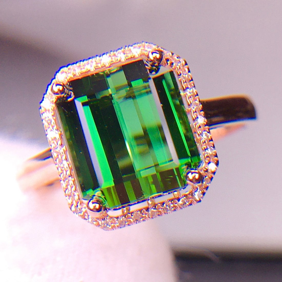 14k Gold 5.2 Ct Natural Tourmaline & Diamond Ring: Ref:231018407 // gold content:14k gold // ring size:7. 25us // // main gemstone:tourmaline // shape:octagonal // carat weight:5. 2ct // color:green // treatment:natural // // adjacent gemstone 2 : dia