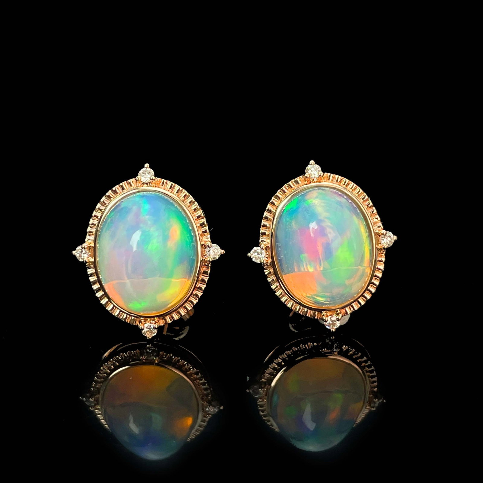 14k Gold 3.44 Ctw Natural Opal & Diamond Earrings: Ref:231019050 // gold content:14k gold // main gemstone:opal // shape:oval // carat weight:3. 4ct // color:color // treatment:natural // // adjacent gemstone 2 : diamond // shape:round // carat