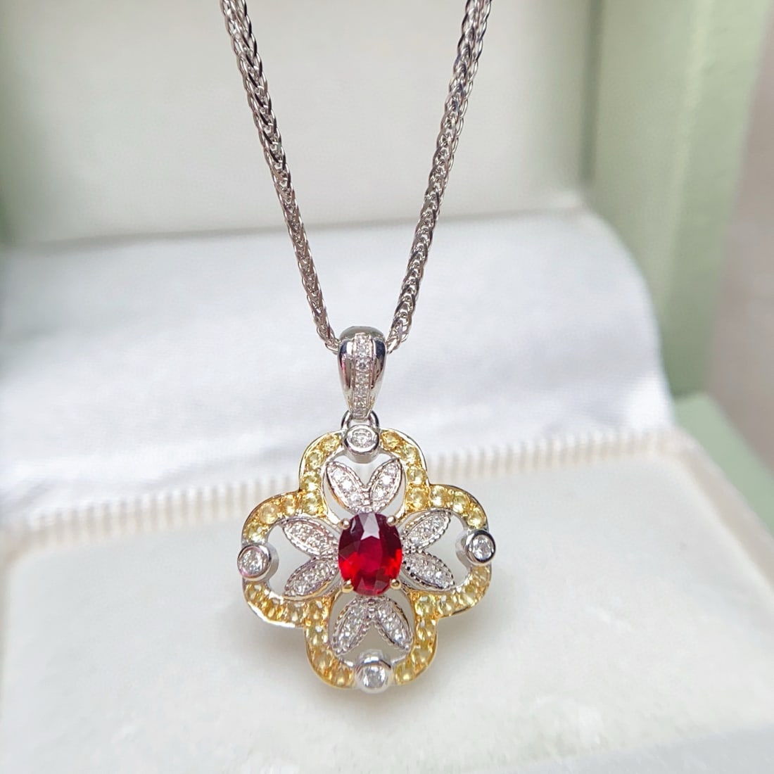 14k Gold 0.4 Ct Natural Ruby & Diamond & Sapphire Pendant( Without Chain ): Ref:231019100 // gold content:14k gold // main gemstone:ruby // shape:oval // carat weight:0. 4ct // color:red // treatment:natural // // adjacent gemstone 2 : diamond // number of stones:30 //