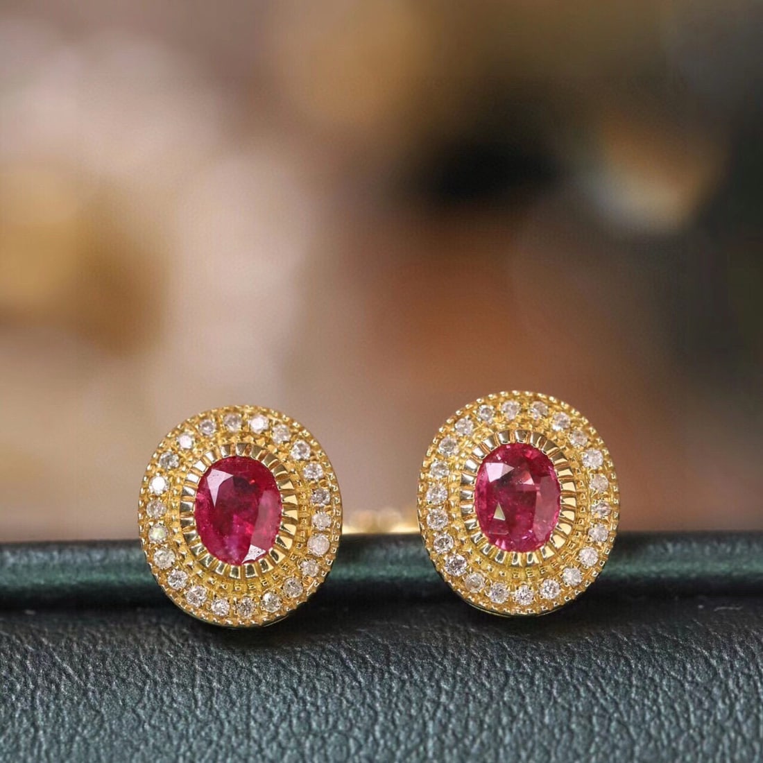 14k Gold 0.72 Ctw Natural Ruby & Diamond Earrings: Ref:231019127 // gold content:14k gold // main gemstone:ruby // shape:oval // carat weight:0. 6ct // color:red // treatment:natural // // adjacent gemstone 2 : diamond // shape:round // carat